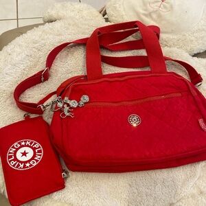 Kipling red shoulder bag with pouch